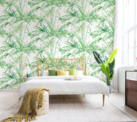 Modern bedroom decorated with Cleo palm sprays tropical wallpaper in yellow green