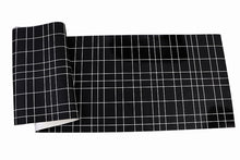 Load image into Gallery viewer, Sheet of black grid patterned vinyl wallpaper