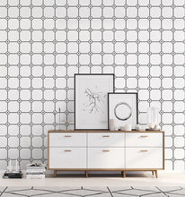 Load image into Gallery viewer, Contemporary bedroom decorated with black and white vinyl grid patterned wallpaper with flower motif