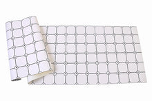 Load image into Gallery viewer, Sheet of black and white grid patterned vinyl wallpaper with flower motif