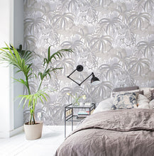 Load image into Gallery viewer, Bedroom decorated with white and silver rainforest foliage patterned non woven wallpaper