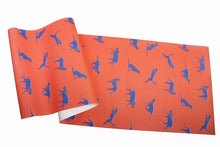 Load image into Gallery viewer, Sheet of leopard patterned vinyl wallpaper in red and blue