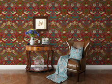 Load image into Gallery viewer, 'The Strawberry Thief' wallpaper designed by William Morris in red vinyl decorating a corridor