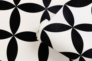 Black and white circle and diamond patterned vinyl wallpaper detail