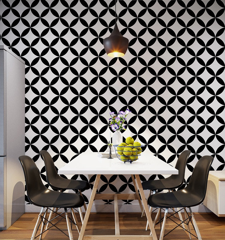 Modern kitchen with black and white circle and diamond patterned vinyl wallpaper