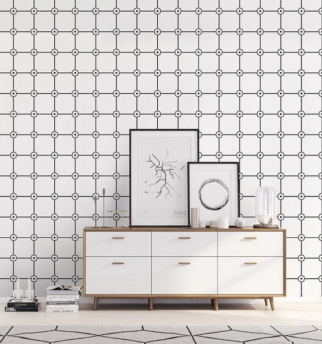 Contemporary bedroom decorated with black and white vinyl grid patterned wallpaper with flower motif