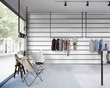 Load image into Gallery viewer, Clothing store decorated with black and white horizontal thin striped wallpaper
